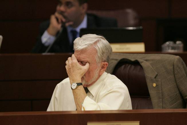 Assemblyman Joe Hogan rubs his eyes during a Monday meeting of the Interim Finance Committee. One difficult choice for Nevada lawmakers is whether to shift money from the Millennium Scholarship and the Dairy Commission to the state's general fund.