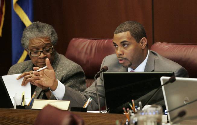 Senate Majority Leader Steven Horsford asks State Budget Director Andrew Clinger a question on the first day of the legislative special session Tuesday, Feb. 23, 2010 in Carson City.