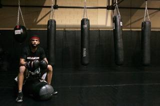 Mixed Martial Arts fighter LC Davis rests between workouts at Xtreme Couture Gym in Las Vegas Wednesday, February 24, 2010.