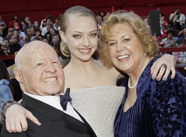 Mickey Rooney, Amanda Seyfried and Jan Rooney arrive at the 82nd Academy Awards Sunday,  March 7, 2010, in the Hollywood section of Los Angeles.