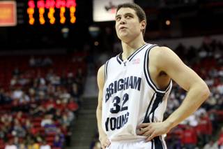 Jimmer Fredette of BYU smirks after getting fouled during Thursday's Mountain West Conference tournament quarterfinal game against TCU at the Thomas & Mack Center.  Fredette scored 45 and BYU advances with a 95-85 win.  