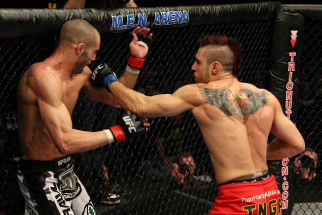Dan Hardy (right) connects with a left hook to Mike Swick during their welterweight bout at UFC 105 on Nov. 14 2009. Hardy won the fight by unanimous decision.