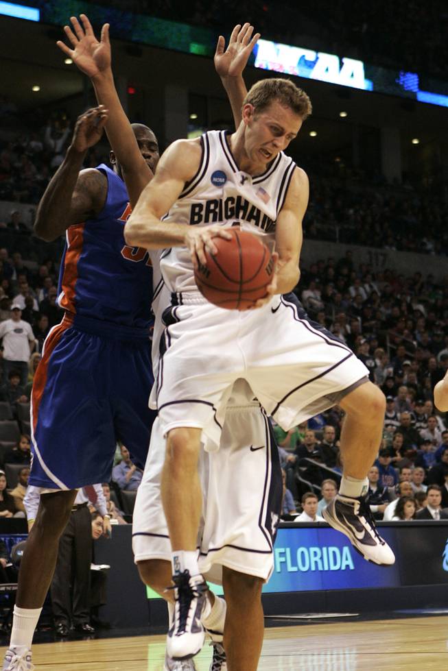 BYU guard Emery Jackson pulls down a defensive board against Florida during the Cougars' first round NCAA tournament game on Thursday, March 18, 2010, at the Ford Center in Oklahoma City.