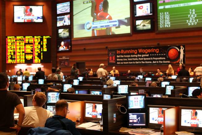 Bettors take in the first weekend of NCAA Tournament action in March 2010 at the M sports book. Northern Iowa was the most notable underdog to shake up the tournament picture heading in to the Sweet 16. 