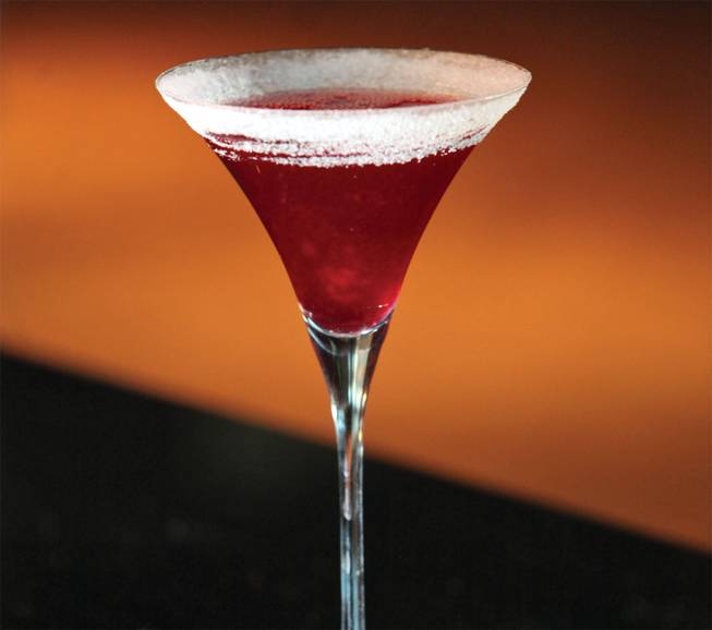If the night ends upstairs at Eve, there's a good chance it began at the steakhouse downstairs, where the Raspberry Beso is that restaurant's signature cocktail. Served in a sugar-rimmed, long-stemmed martini glass, the cocktail sports a sweet, fruity mix of Belvedere raspberry vodka, Briottet creme de cassis, fresh lemon sour, fresh raspberries and just a kiss of Red Bull.