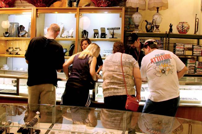 The Gold & Silver Pawn Shop has become more of a tourist attraction. Lines gather outside for a chance to see the merchandise.