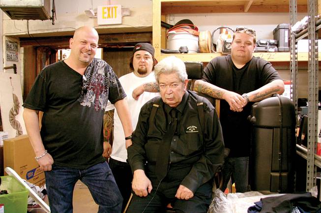"Pawn Stars" stars Rick Harrison, his father Richardson Harrison, his son Corey Harrison and Corey's best friend Austin "Chumlee" Russell (wearing the backwards cap).

