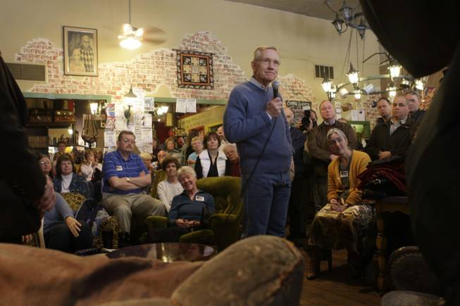 Senate Majority Leader Harry Reid, D-Nev., fields questions at Comma Coffee shop during a campaign stop this month in Carson City. 