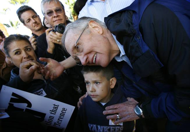 Senate Majority Leader Harry Reid (D-Nev.) greets supporters following a campaign rally in Las Vegas on Monday, April 5, 2010. On Tuesday, Reid was spending the day in Northern Nevada during his campaign bus tour.