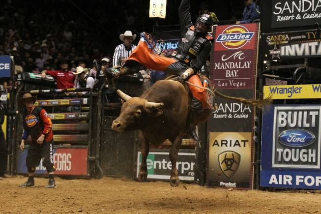 Austin Meier rides Circle T's Cajun Blast for an 88.25 score during the second round of the Albuquerque Built Ford Tough series PBR.