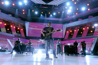 Jason Aldean performs onstage during the 45th Annual Academy of Country Music Awards rehearsals at MGM Grand Garden Arena on April 15, 2010.