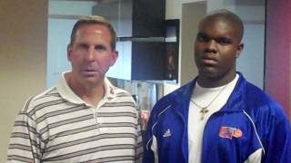 Bishop Gorman High junior football player Jalen Grimble, right, poses for a photo with Nebraska coach Bo Pelini last weekend during an unofficial recruiting trip.