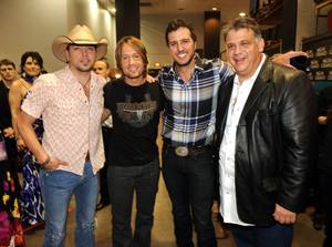 Jason Aldean, Keith Urban, Luke Bryan and Academy of Country Music Executive Director Bob Romeo backstage during <em>ACM Presents: Brooks & Dunn - The Last Rodeo</em> at MGM Grand Garden Arena on April 19, 2010.