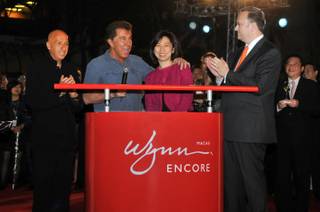 Allan Zeman, Steve Wynn, Linda Chen and Ian Coughlan at the grand opening of Encore Macau on April 21, 2010.
