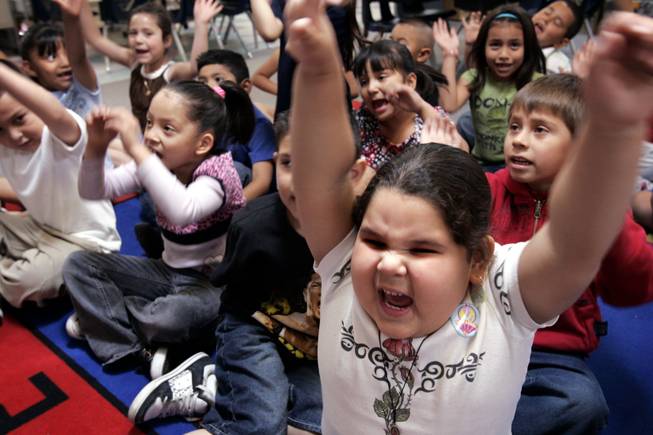 Kindergarten student Griselda Romera gets excited while singing a song in class at Fay Herron Elementary School in North Las Vegas Monday, April 26, 2010.
