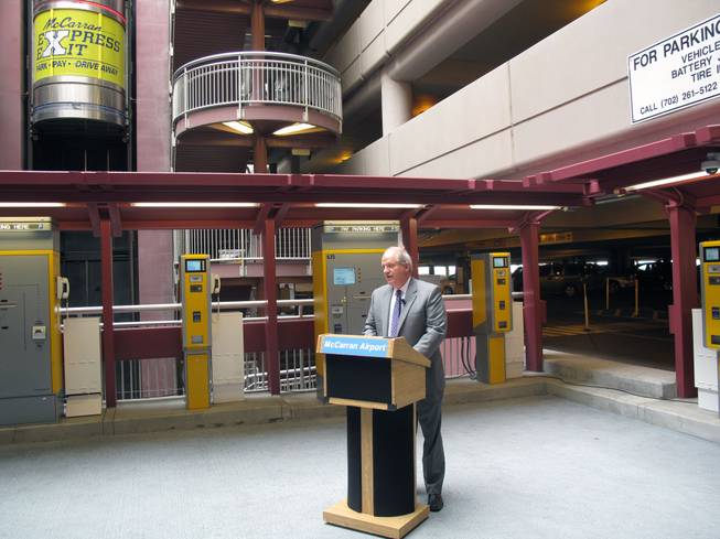 Director of Aviation Randall Walker speaks at a press conference Tuesday about McCarran International Airport's new Express Exit pay system for parking.