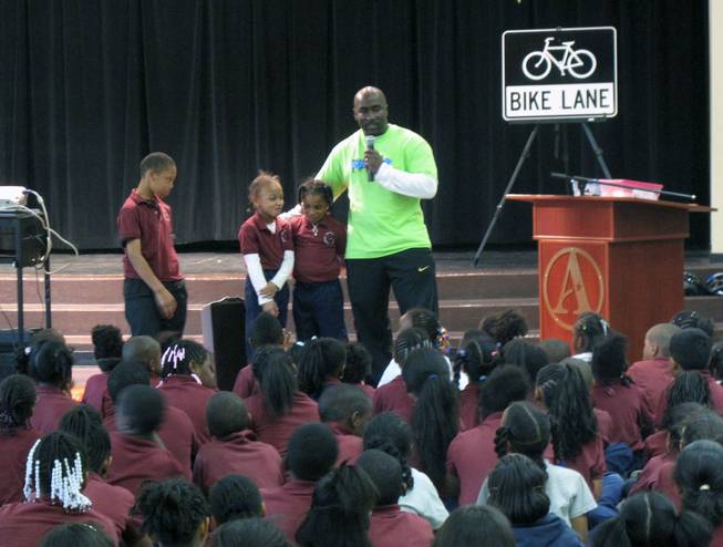 Las Vegas City Councilman Ricki Barlow speaks to students at Agassi Prep on Nevada Moves Day about walking and biking to school.