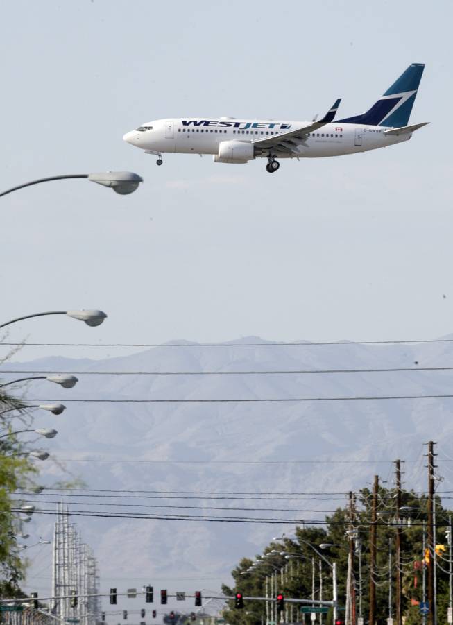 A WestJet plane prepares to land at McCarran International Airport.