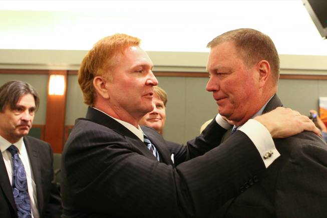 Attorney Robert Eglet congratulates Henry Chanin on Friday after jurors awarded $500 million in punitive damages. 
