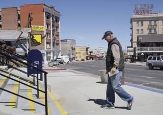 Tonopah resident Jerry Clark heads to check his mail at the post office.