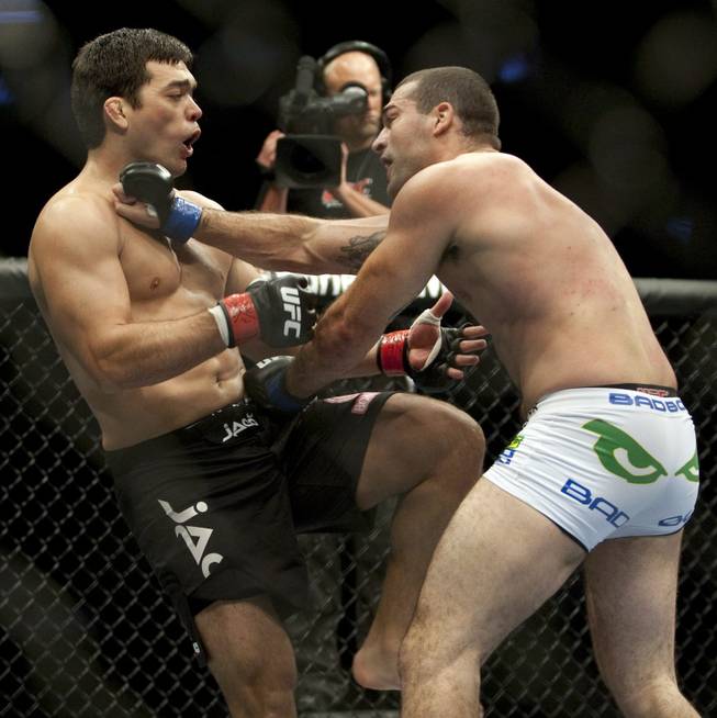Mauricio "Shogun"  Rua, right, trades shots with fellow Brazilian Lyoto Machida in the first round to win the light heavyweight title fight at UFC 113 in Montreal. Shogun knocked out Machida and could have the power to do the same to Jones this weekend at UFC 128. 