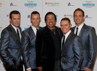 Smokey Robinson is flanked by Human Nature at the Imperial Palace on May 11, 2010.