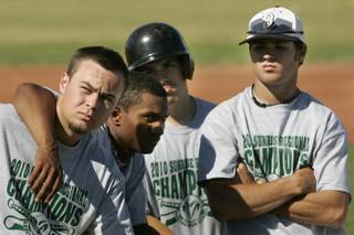 Rancho High School baseball players, from left, Justin Pankratz, Michael Cruz, Manny Llamas and Brandon Pletsch listen to a final speech from their coaches before departing for Reno and the 2010 state baseball championships Tuesday, May 18, 2010.