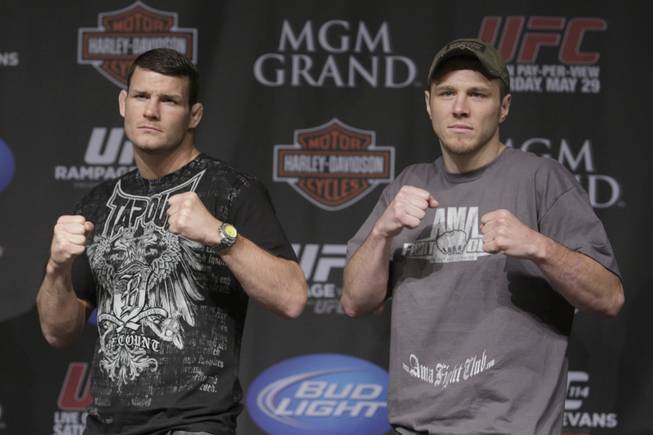 UFC middleweight fighters Michael Bisping, left, and Dan Miller pose during a news conference at the MGM Grand Wednesday, May 26, 2010. The fighters will fight on the Rampage-Evans undercard in UFC 114 at the MGM Grand Garden Arena on Saturday.