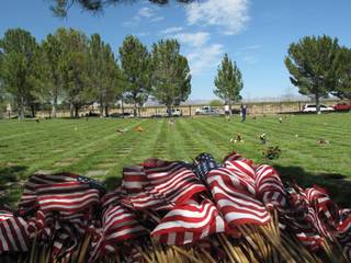 City officials and families gather at the Southern Nevada Veterans Memorial Cemetery in Boulder City on Monday to honor veterans on Memorial Day.