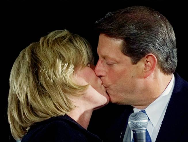 In this Nov. 5, 2000 file photo, then-Democratic presidential candidate Vice President Al Gore gets a kiss from his wife Tipper during a campaign rally at the University of Michigan in Dearborn, Mich. They are separating after 40 years of marriage.