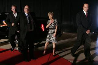 From left, Meyer Lansky II, Vincent Spilotro and Nancy Spilotro are escorted to a media event for the Las Vegas Mob Experience Monday, June 8, 2010 at the Tropicana. Lansky is the grandson of Meyer Lansky, Nancy was the wife of Tony Spilotro and Vincent was his son.