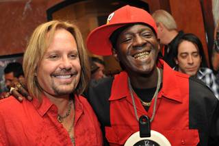 Vince Neil and Flavor Flav at the opening of the Motley Crue rocker's cantina and tequila bar Tres Rios in Las Vegas Hilton on June 12, 2010.