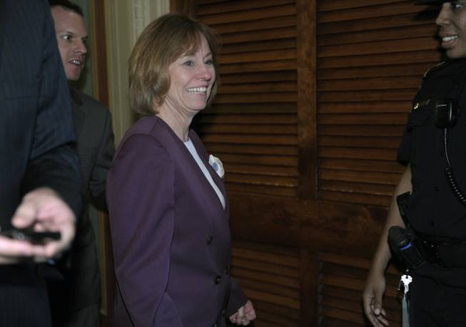 Nevada Republican Senate candidate Sharron Angle walks on Capitol Hill in Washington, Tuesday, June 15, 2010, as she leaves the Republican party policy luncheon. Angle is running against Senate Majority Leader Harry Reid.