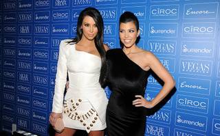 Kim Kardashian and Kourtney Kardashian at Vegas' seventh anniversary party at Surrender in Encore on June 19, 2010.