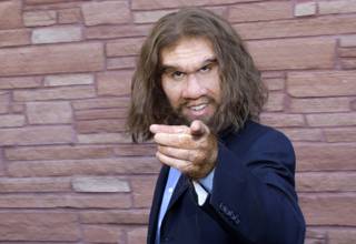 Actor John Lehr, who plays a caveman in a variety of auto insurance commercials, arrives in character at the Palms for the NHL Awards show at the Palms Wednesday June 23, 2010.