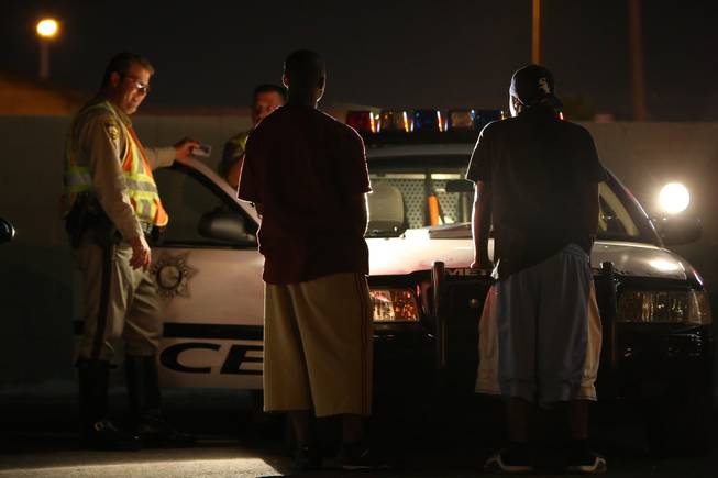 Unidentified passengers are questioned by Metro Police officers after the driver of their vehicle was stopped for suspected impairment July 2, 2010, at a DUI checkpoint on Nellis Boulevard south of East Lake Mead Boulevard.