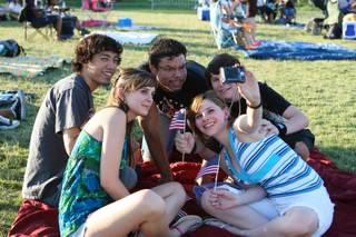 Good buddies strike a pose for a group photo while hanging out together Saturday evening at Seastrand Park during the 11th Annual Independence Day Jubilee in North Las Vegas. Counterclockwise are  Lexeie Chick, Mike Yee, Hector Jeter, Taylor Chick and Brianna Chick.