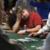 Poker professional Chris Moneymaker competes during the first day of the 41st annual World Series of Poker no-limit Texas Hold 'em main event Monday, July 5, 2010. Moneymaker won the main event in 2003. It's expected that 6,000 to 7,000 players will pay the $10,000 buy-in to enter the tournament, officials said. 