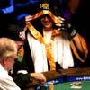 Phil Helmuth, dressed as a mixed martial arts fighter, begins play on the third day of the opening round of the World Series of Poker Main Event on Wednesday at the Rio.