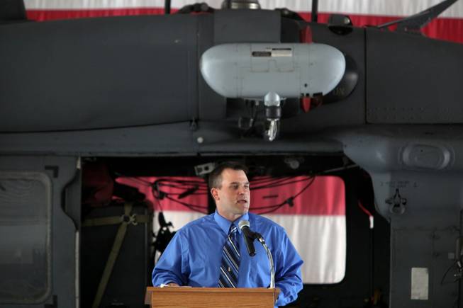 Craig Wisniewski speaks Thursday during a memorial at Nellis Air Force Base for his brother, Capt. David Wisniewski, who died July 2, 2010, from injuries suffered during a helicopter crash in Afghanistan.