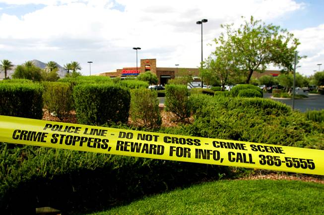 Police tape blocks an entrance at a Costco store in Summerlin after a shooting Saturday, July 10, that left a man dead. Sheriff Doug Gillespie discussed recent shootings Friday afternoon involving Metro officers. 