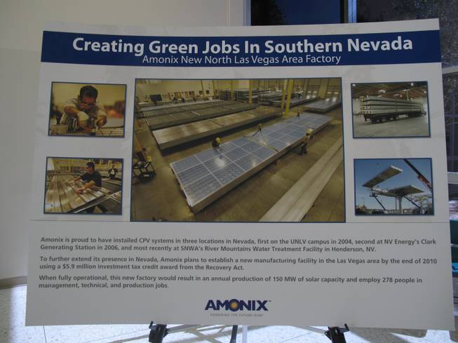 A sign displays what the Amonix solar power plant in North Las Vegas will look like.  The manufacturing plant will create 278 jobs.