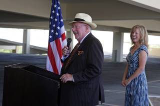 Las Vegas Mayor Oscar Goodman speaks during a groundbreaking ceremony for the U.S. 95 Corridor Improvement Project in the Santa Fe Station parking garage Tuesday, August 3, 2010. Susan Martinovich, director of the Nevada Department of Transportation, listens at right. Elements of the project include widening roads, improving interchanges and constructing sound walls.