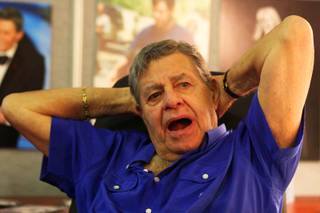 Jerry Lewis sits at his desk at the South Point Hotel Casino Spa in Las Vegas Tuesday, August 24, 2010.  Lewis and the Muscular Dystrophy Association are preparing for the annual Jerry Lewis MDA Labor Day Telethon held over Labor Day weekend.