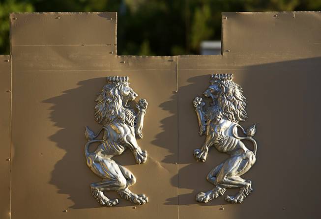 Lions are shown on the back gate at Castle Rancho ...