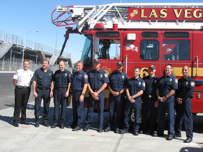 Las Vegas Fire and Rescue members who work at Fire Station 6 pose for a picture after the grand opening of the building Monday morning. The new station includes classroom space specifically designed for students studying fire science at the College of Southern Nevada Charleston Campus.