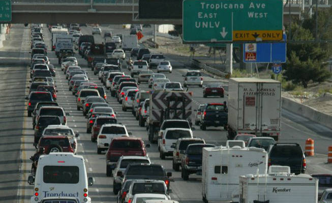 Motorists navigate rush hour traffic on Interstate 15 near the Strip. 