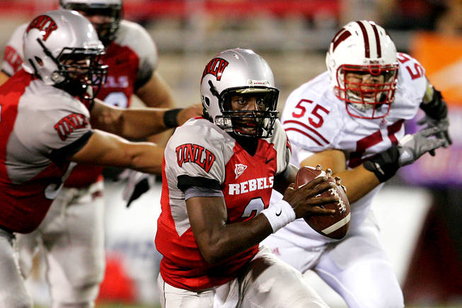 UNLV quarterback Omar Clayton scrambles for a gain against Wisconsin during their season opening game  Saturday, September 4, 2010 at Sam Boyd Stadium. Wisconsin won the game 41-21.