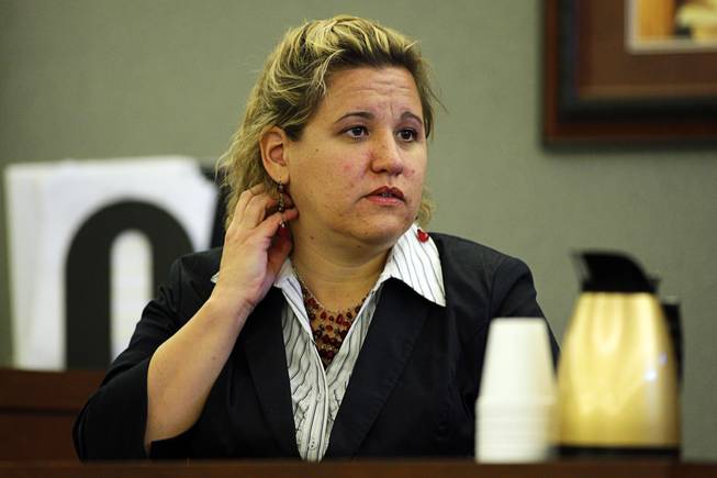 Lisa Gavin, a medical examiner with the Clark County Coroner's Office, describes an entry wound as she testifies during an inquest for the shooting of Richard Nolton Sr. at the Regional Justice Center Friday, Sept. 10, 2010.  Nolton was shot by an officer in Henderson in July.