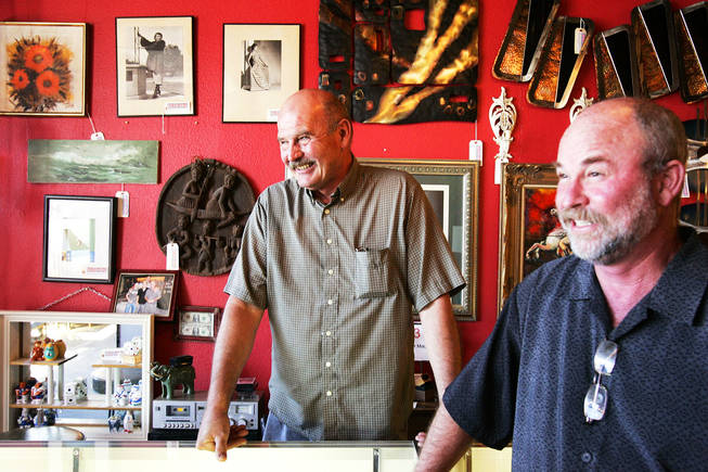 Co-owners Bill Johnson, right, and Marc Comstock stand in the entrance at Retro Vegas, which is located in the Arts District on South Main Street near Charleston Boulevard in downtown Las Vegas Thursday, September 16, 2010.